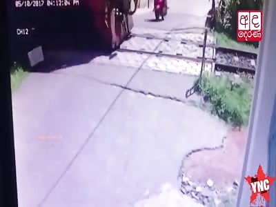 a train takes Motorcyclist life