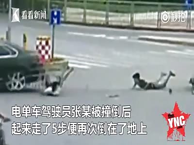 Scooter runs a red light and hits by car, rider gets up but later dies