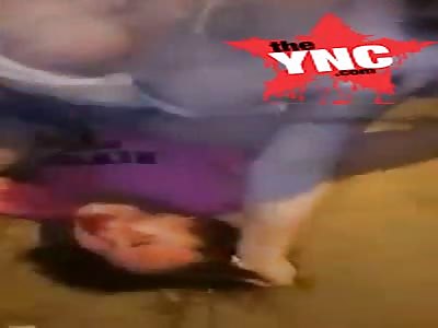 a Thai woman gives another woman a good beating