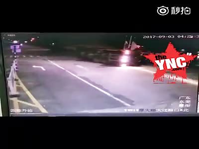 The car was instantly crushed by a large truck full of sand