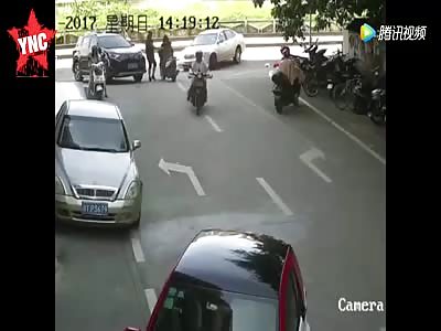  a silver Chery sedan hits 2