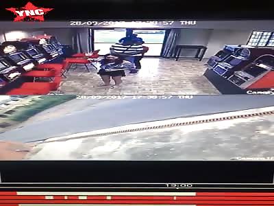 Robber Holding 2 Hostages is Quickly Shot to Death by One of Them....