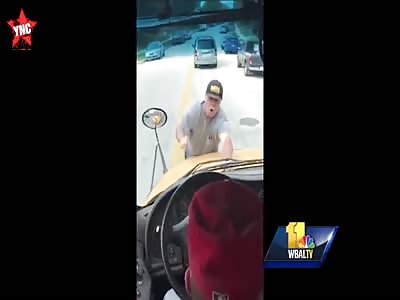 in Maryland ver angry man clinging to front of moving school bus