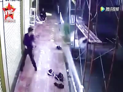 out of control car drives into scaffolding workers lucky to be alive