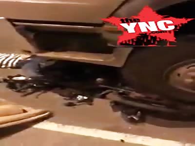 two youths pray to Buddha offering incense next to there dead friend 