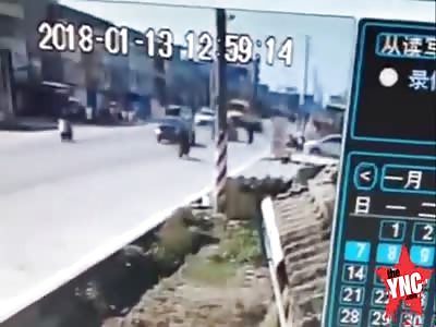 one died when Their  bike crashed into a school bus in Guangdong 