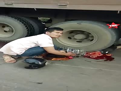youth crushed under a truck in Cambodia 