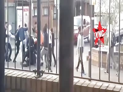  a man swung a machete during a 20-person street brawl in Birmingham,England