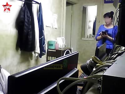 man punches two woman at a taxi rank in Russia  