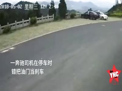 man drives his  Mercedes-Benz of a cliff   in Cangnan County 