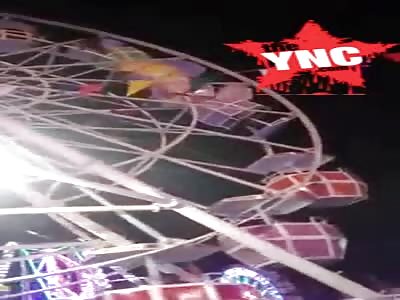 Ferris Wheel stop working with people on it in Sekaten Yogyakarta