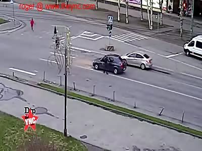 two russians have a fight on the zebra crossing then one crashes there Renault Logan in Petrozavodsk