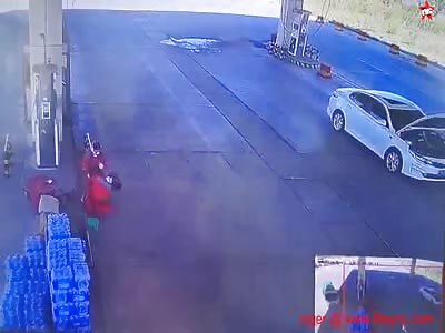 petrol station hose hits man in the head in Ningdong