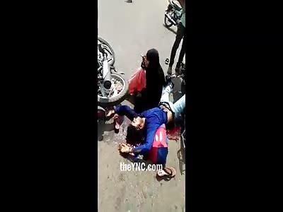 Woman Cries Disconsolately to see her Husband Agonizing to Death