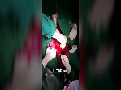 Removing a Rocket of the ass of a Syrian Soldier