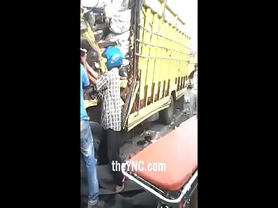 Shredded Man Between the Irons of Car 