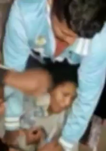 Two Girls being Punished in Brazilian Favela  