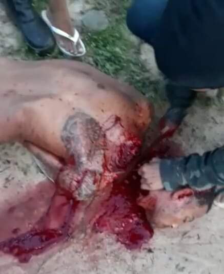 Rival Gang Cut Into and Beheaded