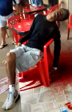 Fully Relaxed in his Chair in Brazilian Style