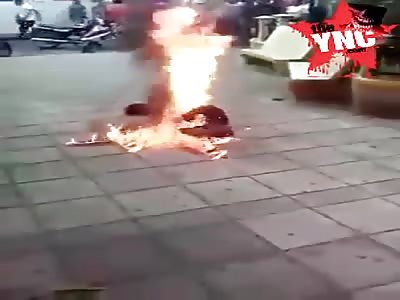 Protestant sets on fire