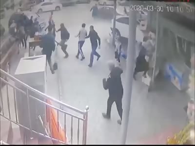 Out of control car killed two at a street stall.