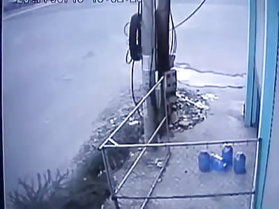 Biker T-boned hard by car.