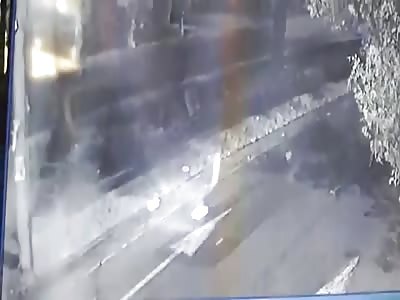 Hitmen execute two people in a car in Columbia.