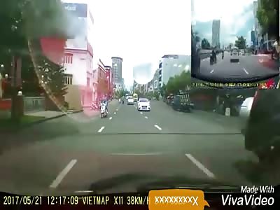 Motorcyclist hit by a car then flattened by a motorbike