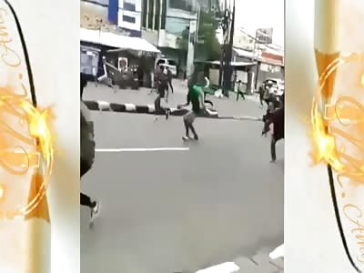 Gangs fight in the street