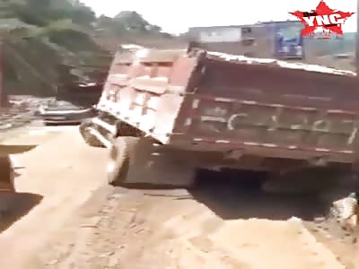 Truck rolls off a cliff