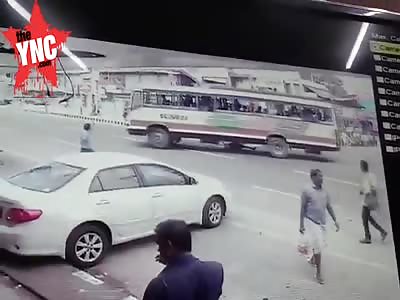 Bus runs over a woman