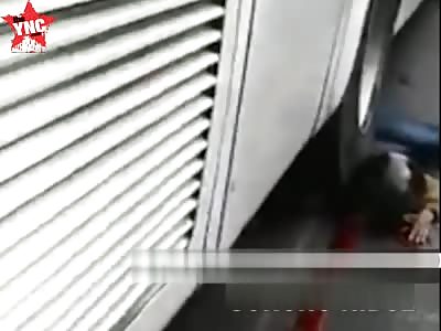 Woman crushed under the wheel of a bus