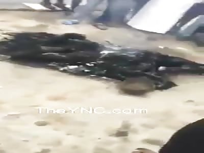 Thug smoulders after being burned alive