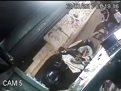 Thug shoots up a bar in Brazil