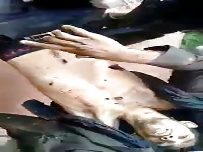 4 Dead criminals unloaded from the back of a van by police