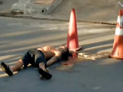 Thug laid dead in his blood