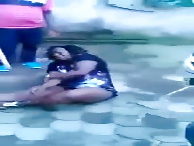 Woman Wails as she is Hit with Sticks and Caned by Group of Men