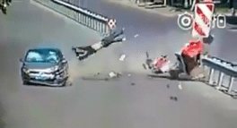 Biker Smashes into Car Like a Ragdoll