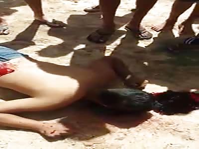 Murdered Youth Surrounded by Flip Flops