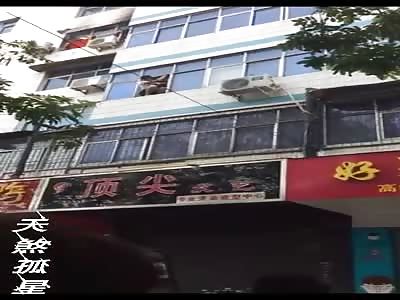 Man Jumps from Burning Building