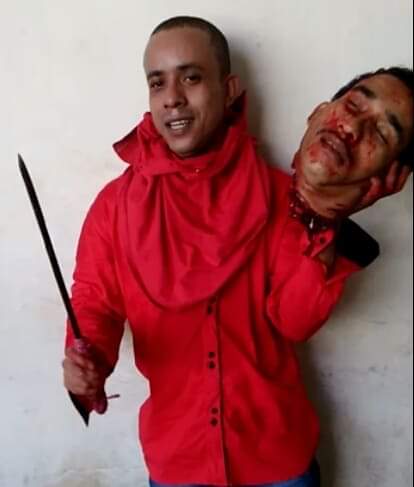 More Footage, Dead Prisoner Cut Into and Beheaded.