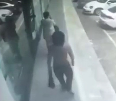 Scumbag Sucker Punches Lady in China