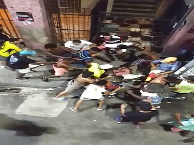 Black hit by crowd of people