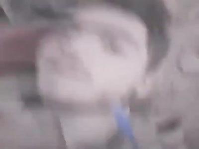 The consequences of an air strike on militants at the front near Serak