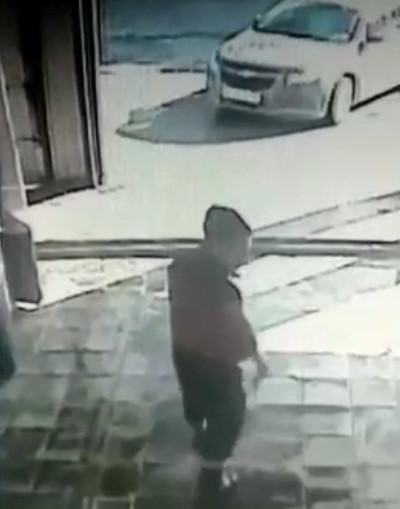 Young man crushed by his boss's car