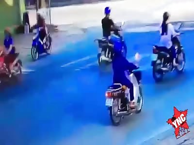 Ouch, Motorcyclist Crushed by Car