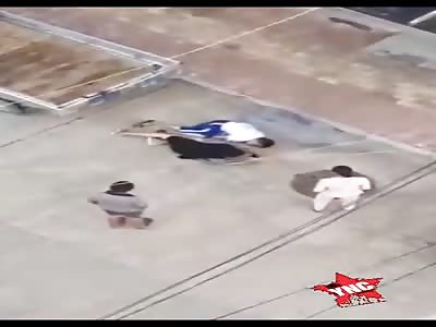 young man commits suicide, building jump