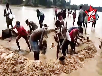 the body of a woman in the river Mand