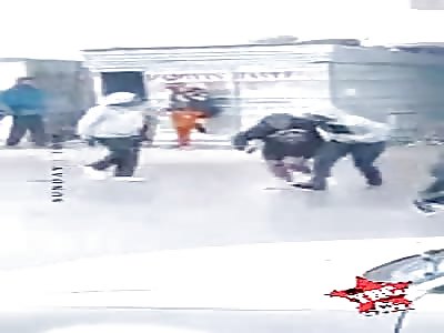 Hitman opens fire in broad daylight