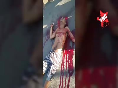 Man killed by multiple shots, body dumped in the street.